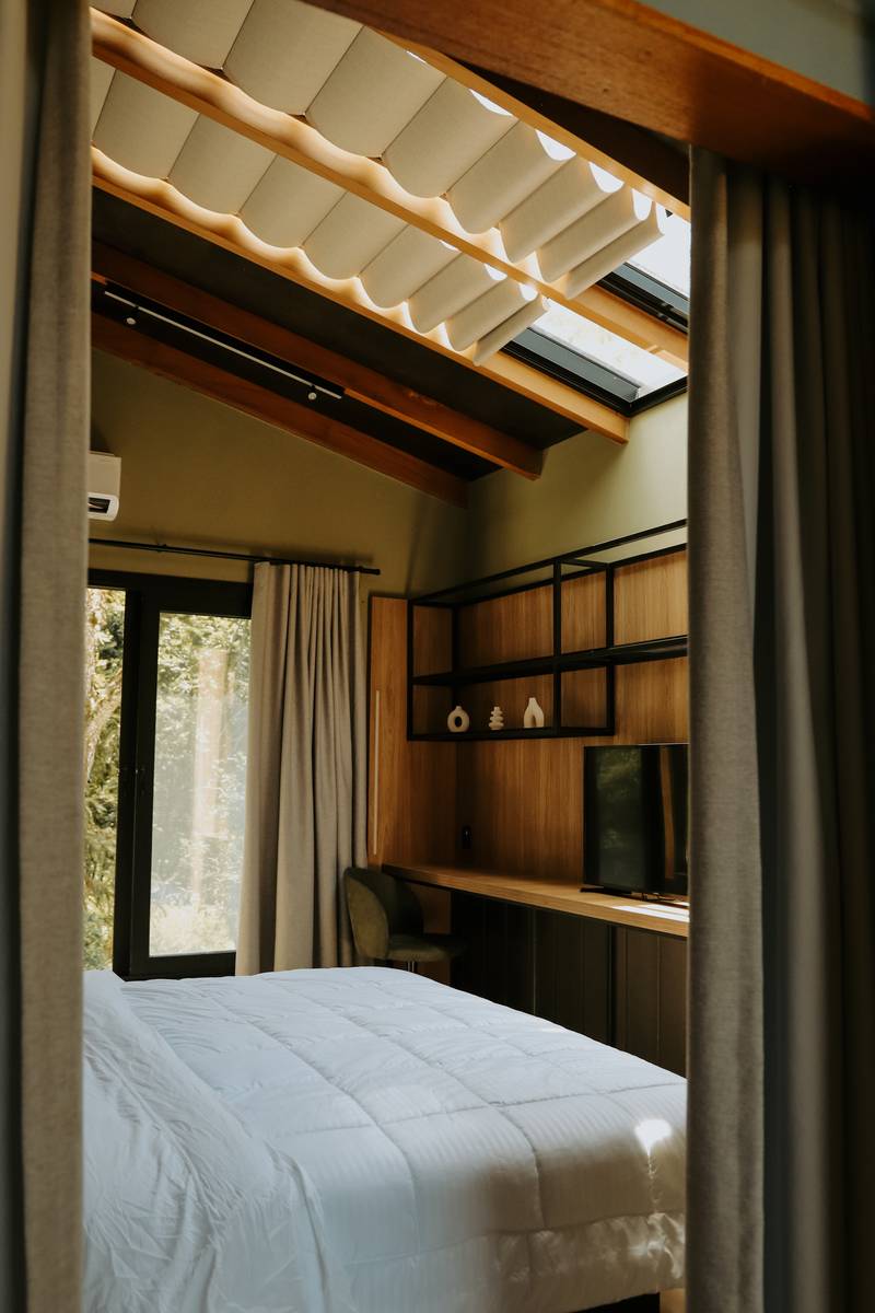 Cabana Azul: teto solar sobre a cama